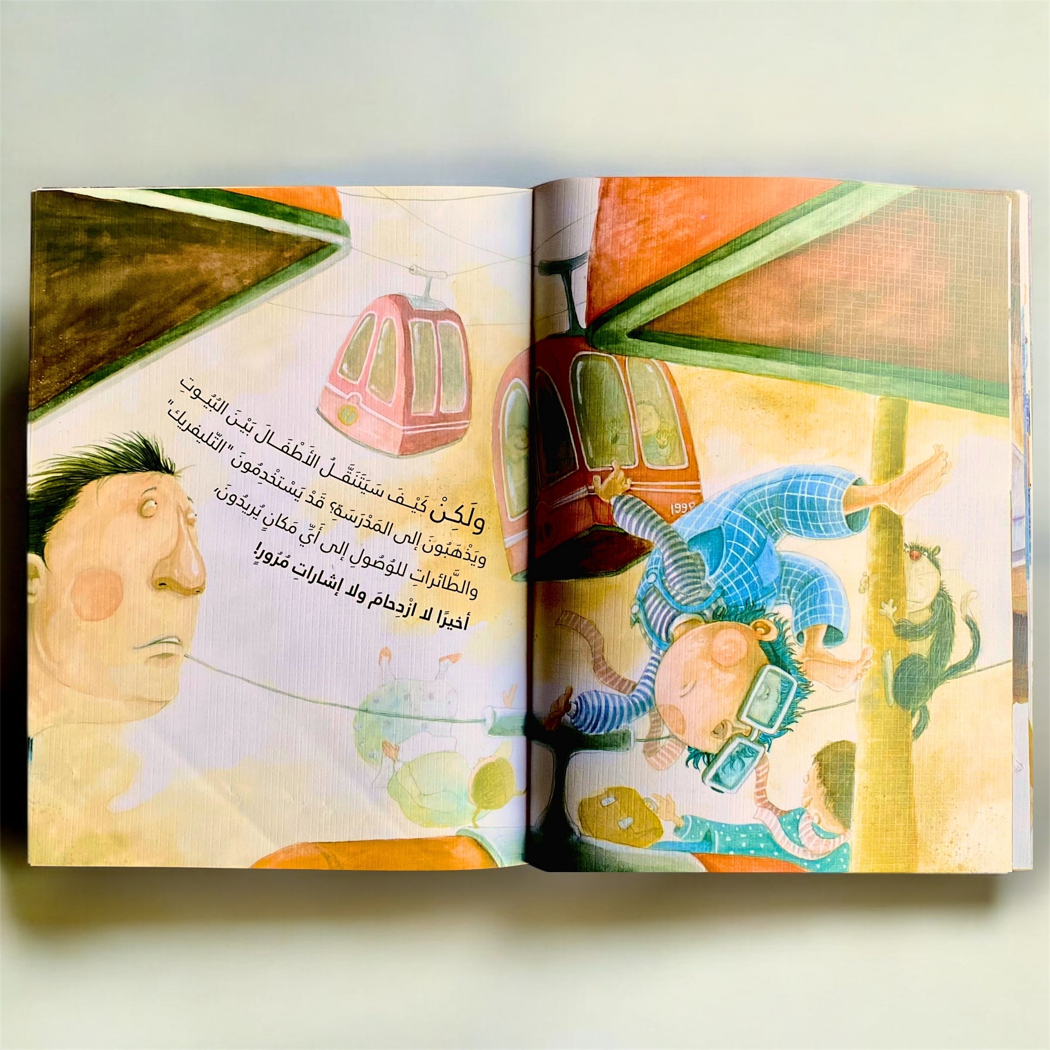 Open book with colorful illustrations on a white background